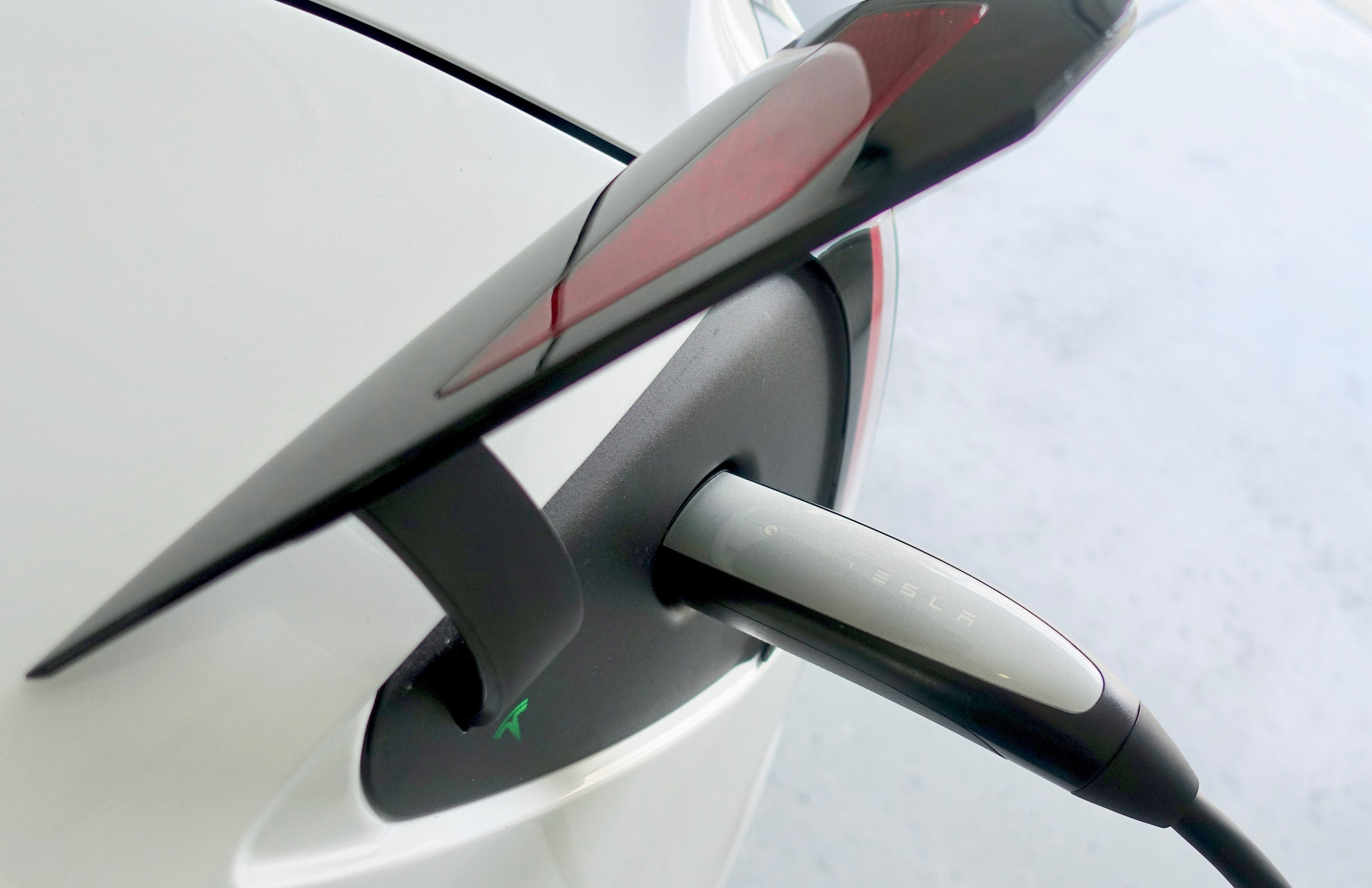 "Tesla Model 3 Charging" by jurvetson is licensed under